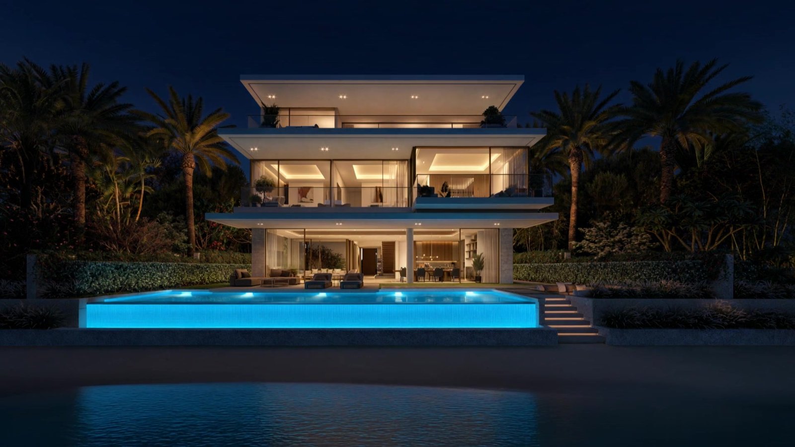 Luxury beachfront villa at night